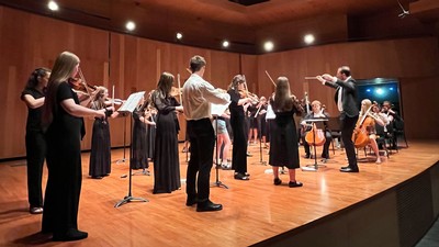 Students play in a chamber music recital.