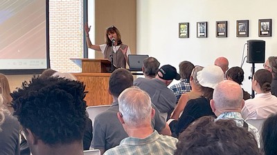 Jennifer Sinor speaking at an event.