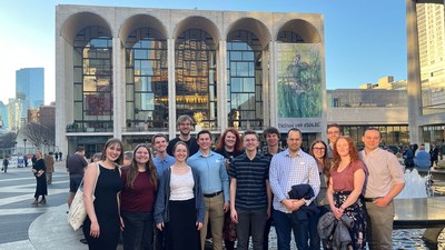 Students posing for a group photo in New York.