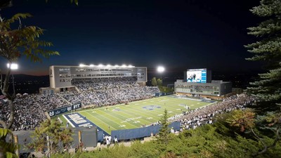 USU's Maverik Stadium during a football game at night.