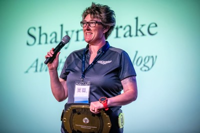 Shalyn Drake speaking at a conference.