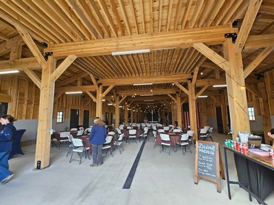 The interior of a large barn.