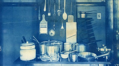 A historical photograph of a kitchen.