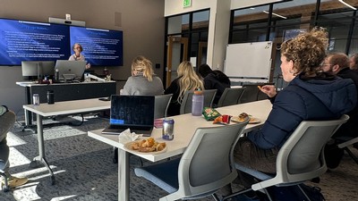 A person teaching a nursing class.