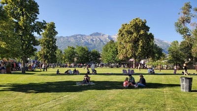 People attending an event at a city park.
