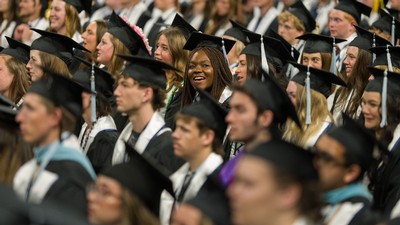 Students at a graduation ceremony.