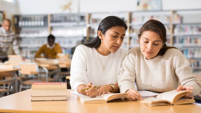 People studying at a library.