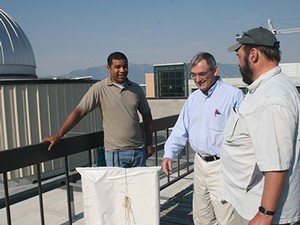 USU physicists inspect antennas