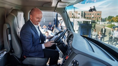 Utah Gov. Spencer Cox in the driver’s seat of an electric vehicle on the ASPIRE test track.