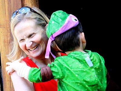 Amy Henningsen holds a child