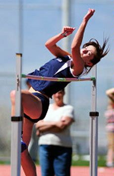 A USU student athlete competing in track and field