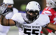 Utah State football player in action