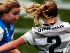 A USU soccer player in action on the field