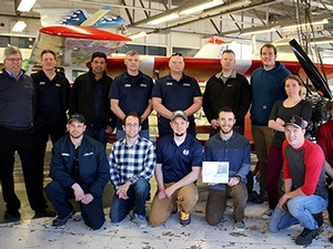 Faculty advisors and members of USU’s Aviation Maintenance team