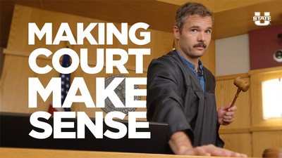 A person in judge's robes holding a gavel. Text reads: Making court make sense.