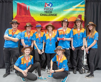 Members of the Team Without a Cool Acronym (TWCA) pose with their medals at the FIRST Tech Challenge