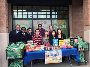 USU students conducting a food drive and collection at a supermarket