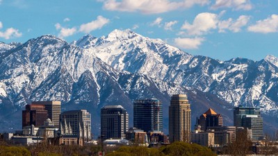 Salt Lake City with snowy mountains in the background.