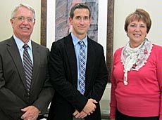 USU President Stan Albrecht, professor Chris Corcoran, Joyce Albrecht