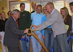 President Albrecht and ASUSU President Quinn Millet cut the ribbon at the Information Center