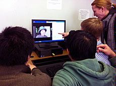 USU students at laptop working on translation project