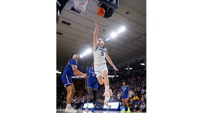 Jordy Barnes attempts a lay up