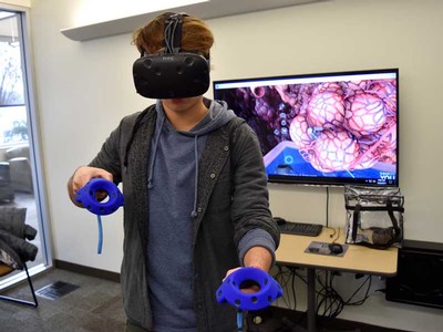 person wearing virtual reality glasses