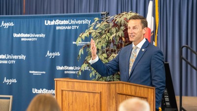 USU President Brad L. Mortensen speaking at an event.