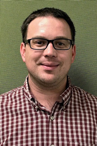 Michael Clayton poses for a portrait.