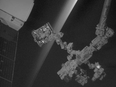 SDL built dewar is shown here being removed from the SpaceX Dragon trunk