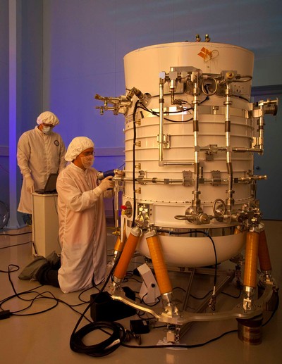 In this 2009 photograph, SDL engineers prepare the Wide-field Infrared Survey Explorer telescope.