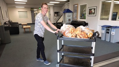 Student volunteer delivers food for SNAC.