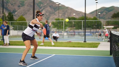 A person playing pickleball.