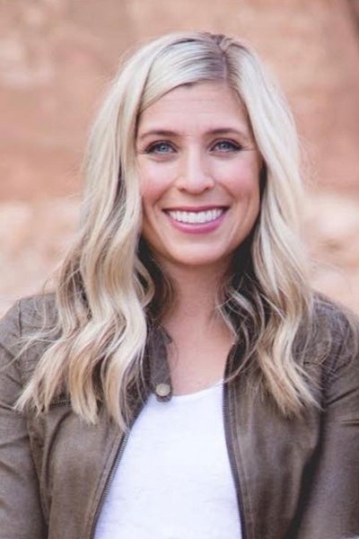 A woman poses for a photo