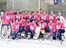 USU Hockey team in the 'Pink on the Rink' uniform for a fundraiser