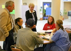 Persident Albrecht and Joyce Albrecht talk with students