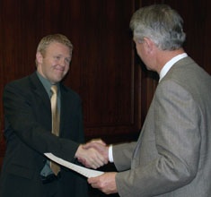 Quinn Millet is congratulated by Gayle McKeachnie