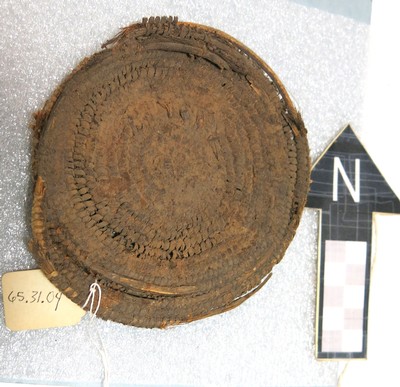 a woven platter from the Museum of Anthropology collection.