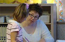 USU ArtsBridge Scholar Alicia Martin with a student