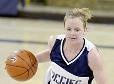 Alice Coddington, USU women's basketball, in action