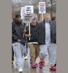 USU football players in 'Walk-a-Mile
