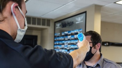 USU airport procedures now include facemasks, touchless temperature checks, and sanitizing planes.