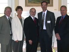 USU administrators with Professor Heath