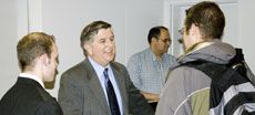 Ken Woolley with USU students