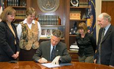 Joyce Kinkead and group with Gov. Huntsman