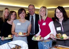President Albrecht with soccer team members