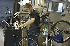 USU Aggie Blue Bikes shop, worker
