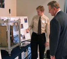 Representative Fred Hunsaker and a USU student