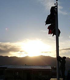 Aggie Dana King raises flag in Afghanistan
