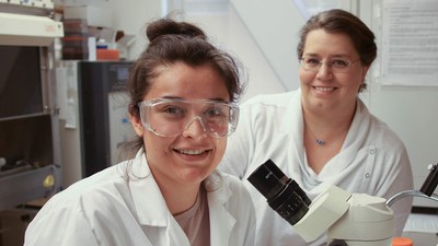 Abby Benninghoff with a student.